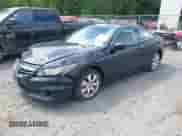 2012 Honda Accord LX-S with VIN 1HGCS1B35CA000919, listed as a IAAI auction lot 42704977 with 273,485 mi miles and . Bid and sale history available at DreamBid. Image 2.