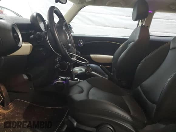2012 MINI Hardtop with VIN WMWSU3C56CT543312, listed as a Copart auction lot 55786805 with 138,713 mi miles and Salvage title. Bid and sale history available at DreamBid. Image 7.