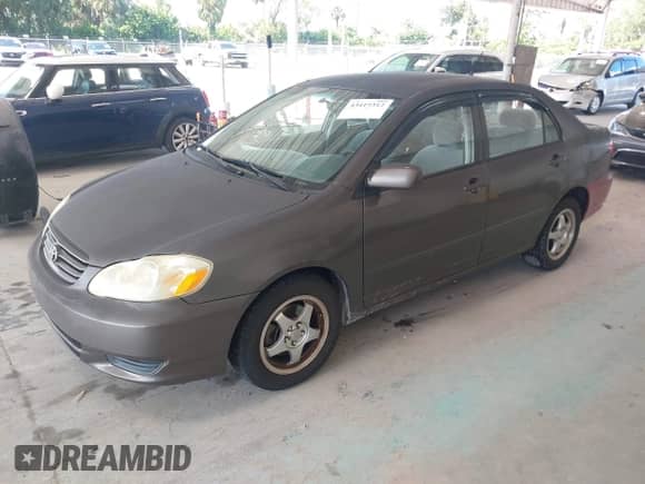 2004 Toyota Corolla CE z VIN 1NXBR32E44Z274868, wystawiony jako IAAI lot #43415312 z przebiegiem 299 999 mil mil oraz . Historia ofert i sprzedaży dostępna na DreamBid. Obrazek 2.