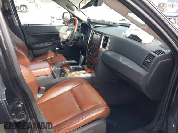 2009 Jeep Grand Cherokee with VIN 1J8HS68T49C524111, listed as a IAAI auction lot 41605917 with 133,441 mi miles and . Bid and sale history available at DreamBid. Image 5.