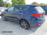 2018 Hyundai Santa Fe 2.4L z VIN 5XYZTDLB7JG562119, wystawiony jako IAAI lot #43221548 z przebiegiem 244 228 mil mil oraz . Historia ofert i sprzedaży dostępna na DreamBid. Obrazek 3.