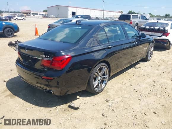 2014 BMW 7 Series ALPINA B7 xDrive with VIN WBAYF8C59ED653799, listed as a IAAI auction lot 42724753 with 146,906 mi miles and . Bid and sale history available at DreamBid. Image 4.
