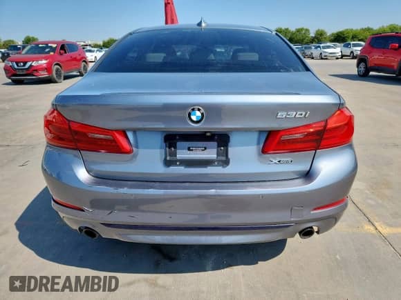2019 BMW 5 Series 530i с VIN WBAJA5C51KWW00562, выставлен на аукционе Copart как лот 71504985 с пробегом 98 046 миль миль и Чистый • Clean title. История ставок и продаж доступна на DreamBid. Изображение 6.