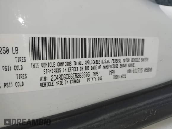 2014 Dodge Grand Caravan SXT with VIN 2C4RDGCG6ER263605, listed as a IAAI auction lot 42992307 with 204,426 mi miles and . Bid and sale history available at DreamBid. Image 9.