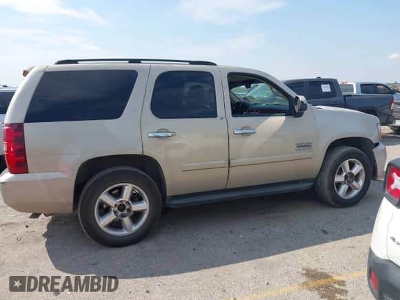 2007 Chevrolet Tahoe LT with VIN 1GNFC13067R104587, listed as a IAAI auction lot 43223507 with 217,966 mi miles and . Bid and sale history available at DreamBid. Image 13.