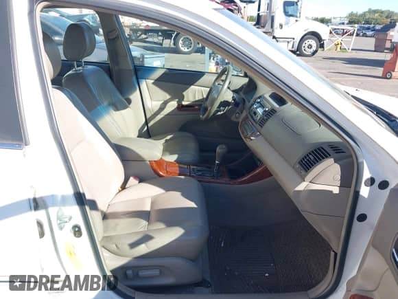 2002 Toyota Camry XLE with VIN JTDBF30K820001796, listed as a IAAI auction lot 43399201 with 235,451 mi miles and . Bid and sale history available at DreamBid. Image 5.