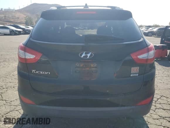 2014 Hyundai Tucson Walking Dead Edition с VIN KM8JUCAG7EU936733, выставлен на аукционе Copart как лот 71506025 с пробегом Не указан миль и Списание • Salvage title. История ставок и продаж доступна на DreamBid. Изображение 6.