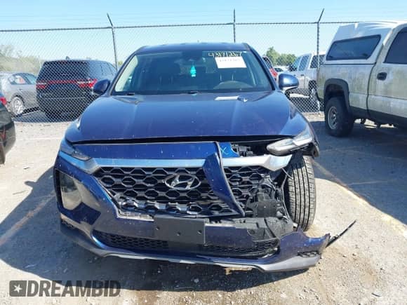 2020 Hyundai Santa Fe SE with VIN 5NMS2CAD5LH229638, listed as a IAAI auction lot 43171267 with 126,613 mi miles and . Bid and sale history available at DreamBid. Image 12.