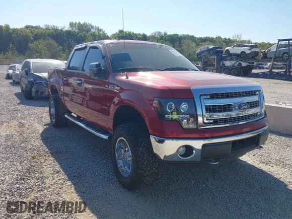 2014 Ford F-150 FX4 with VIN 1FTFW1ET7EFA60654, listed as a IAAI auction lot 43217408 with 158,212 mi miles and . Bid and sale history available at DreamBid. Image 1.
