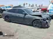 2023 BMW i4 eDrive35 with VIN WBY43AW0XPFR19726, listed as a Copart auction lot 64955865 with 16,952 mi miles and Salvage title. Bid and sale history available at DreamBid. Image 4.