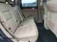 2012 Jeep Grand Cherokee Limited z VIN 1C4RJFBG8CC300891, wystawiony jako Copart lot #84041155 z przebiegiem 141 239 mil mil oraz Czysty tytuł • Clean title. Historia ofert i sprzedaży dostępna na DreamBid. Obrazek 11.