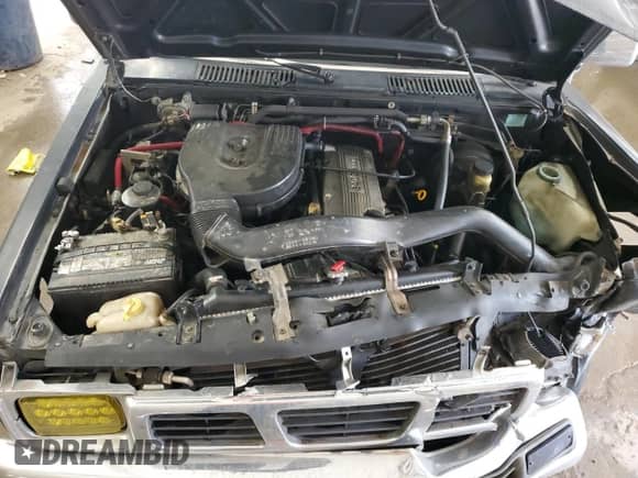 1996 Nissan Frontier XE with VIN 1N6SD11S5TC350615, listed as a Copart auction lot 58904035 with 190,067 mi miles and Salvage title. Bid and sale history available at DreamBid. Image 11.