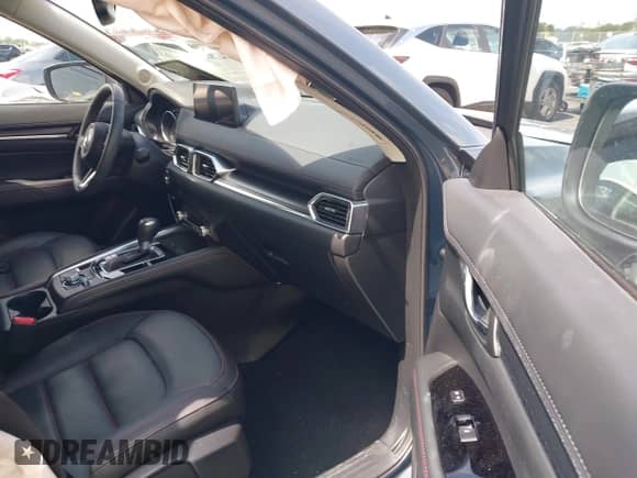 2023 Mazda CX-5 S Preferred z VIN JM3KFBCM5P0173905, wystawiony jako IAAI lot #42485200 z przebiegiem 26 333 mil mil oraz . Historia ofert i sprzedaży dostępna na DreamBid. Obrazek 5.