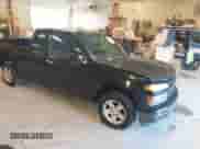 2009 Chevrolet Colorado Work Truck with VIN 1GCCS19E398127383, listed as a IAAI auction lot 43310054 with 129,208 mi miles and . Bid and sale history available at DreamBid. Image 1.