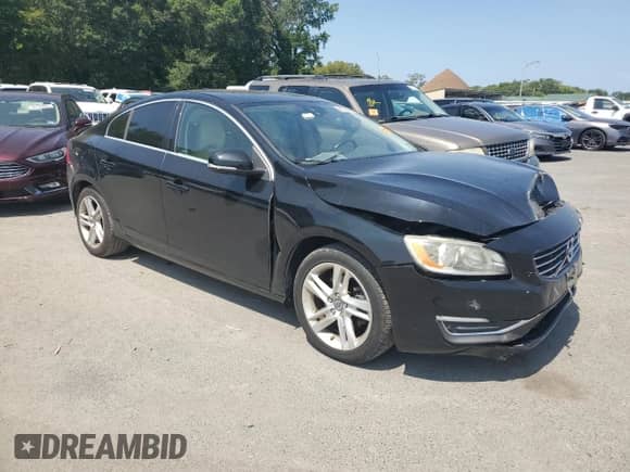 2015 Volvo S60 T5 Drive-E Premier with VIN YV140MFK6F2336518, listed as a Copart auction lot 68339405 with 142,401 mi miles and Salvage title. Bid and sale history available at DreamBid. Image 4.