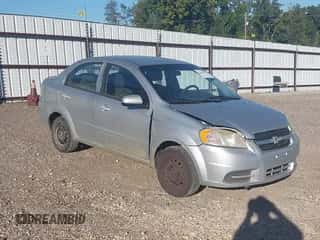 2011 Chevrolet Aveo 1LT z VIN KL1TD5DE1BB234313, wystawiony jako IAAI lot #43457941 z przebiegiem 189 918 mil mil oraz . Historia ofert i sprzedaży dostępna na DreamBid. Obrazek 1.