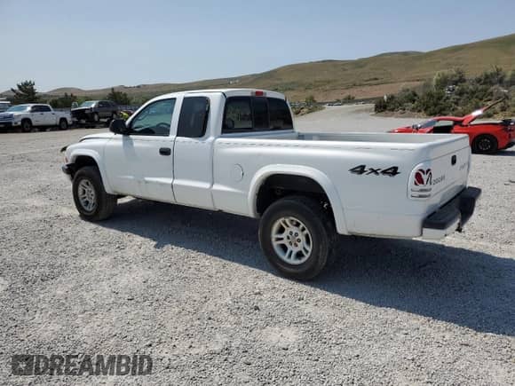 2004 Dodge Dakota Sport with VIN 1D7HG32N04S644610, listed as a Copart auction lot 59817585 with 209,360 mi miles and Salvage title. Bid and sale history available at DreamBid. Image 2.