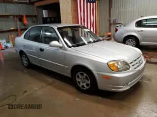 2004 Hyundai Accent GL с VIN KMHCG45C04U544804, выставлен на аукционе Copart как лот 72912984 с пробегом 121 178 миль миль и Списание • Salvage title. История ставок и продаж доступна на DreamBid. Изображение 4.
