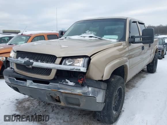 2004 Chevrolet Silverado 2500 LS z VIN 1GCGC23U14F137211, wystawiony jako IAAI lot #41269562 z przebiegiem 298 317 mil mil oraz . Historia ofert i sprzedaży dostępna na DreamBid. Obrazek 2.