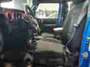 2023 Jeep Wrangler Rubicon with VIN 1C4HJXFN7PW693166, listed as a Copart auction lot 84430324 with 40,093 mi miles and Salvage title. Bid and sale history available at DreamBid. Image 7.