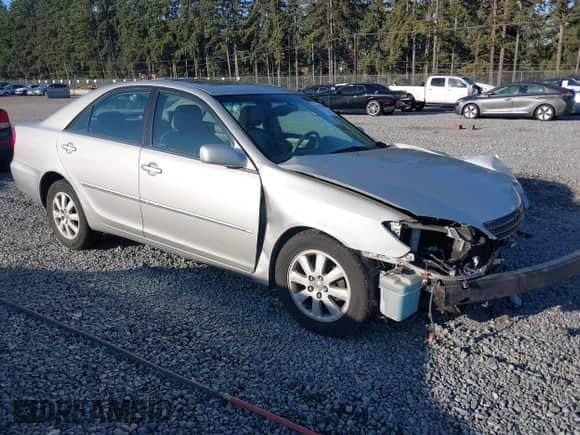 2003 Toyota Camry LE with VIN 4T1BE32K43U188802, listed as a IAAI auction lot 43305609 with 260,018 mi miles and . Bid and sale history available at DreamBid. Image 1.