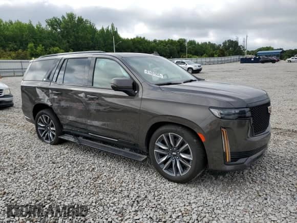 2021 Cadillac Escalade Sport with VIN 1GYS3FKL7MR432882, listed as a Copart auction lot 61437955 with 55,277 mi miles and Salvage title. Bid and sale history available at DreamBid. Image 4.
