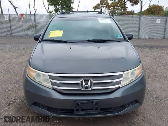 2012 Honda Odyssey EX z VIN 5FNRL5H40CB083650, wystawiony jako IAAI lot #43283741 z przebiegiem 164 693 mil mil oraz . Historia ofert i sprzedaży dostępna na DreamBid. Obrazek 12.