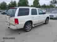 2005 Cadillac Escalade z VIN 1GYEK63N95R231907, wystawiony jako IAAI lot #43433866 z przebiegiem 164 453 mil mil oraz . Historia ofert i sprzedaży dostępna na DreamBid. Obrazek 4.