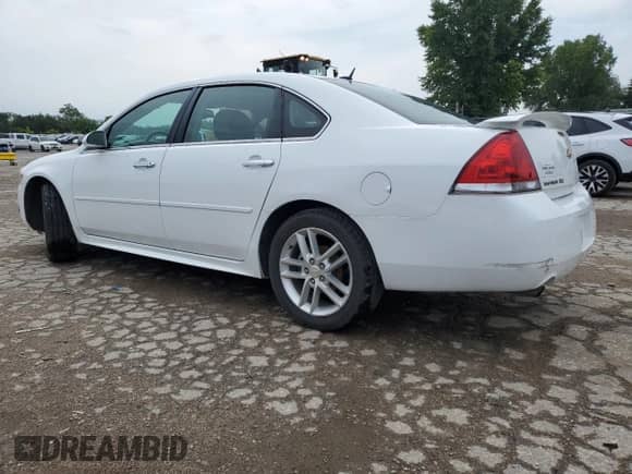 2015 Chevrolet Impala LTZ with VIN 2G1WC5E31F1107551, listed as a Copart auction lot 68236714 with 114,993 mi miles and Salvage title. Bid and sale history available at DreamBid. Image 2.