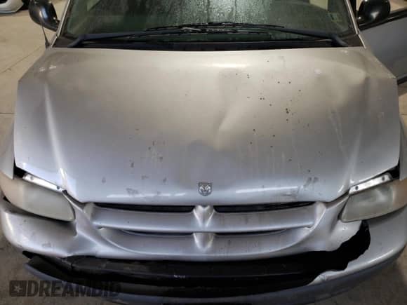2000 Dodge Caravan with VIN 2B4GP25R4YR662501, listed as a Copart auction lot 78211184 with 95,679 mi miles and Salvage title. Bid and sale history available at DreamBid. Image 14.