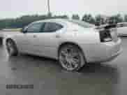 2010 Dodge Charger R/T with VIN 2B3CA5CT6AH115150, listed as a Copart auction lot 59514445 with 163,080 mi miles and Salvage title. Bid and sale history available at DreamBid. Image 2.