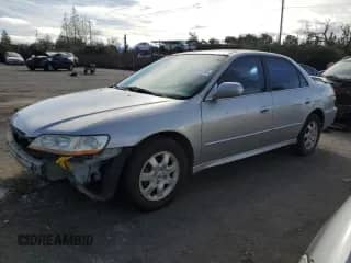 2002 Honda Accord EX with VIN JHMCG660X2C030142, listed as a Copart auction lot 86366424 with 215,783 mi miles and Salvage title. Bid and sale history available at DreamBid. Image 1.