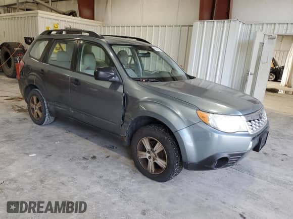 2012 Subaru Forester X z VIN JF2SHABC2CH409963, wystawiony jako Copart lot #90790275 z przebiegiem 173 208 mil mil oraz Czysty tytuł • Clean title. Historia ofert i sprzedaży dostępna na DreamBid. Obrazek 4.