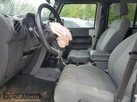 2007 Jeep Wrangler Unlimited Rubicon with VIN 1J4GA69167L190996, listed as a Copart auction lot 51627285 with Not provided miles and Salvage title. Bid and sale history available at DreamBid. Image 7.