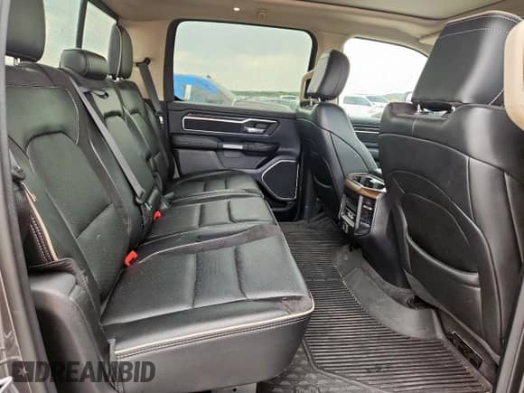 2021 Ram 1500 Laramie z VIN 1C6SRFJTXMN548842, wystawiony jako Copart lot #69980945 z przebiegiem 61 163 mil mil oraz Szkoda całkowita • Salvage title. Historia ofert i sprzedaży dostępna na DreamBid. Obrazek 11.