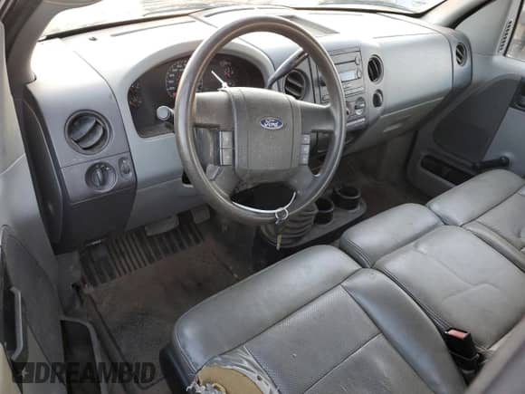 2007 Ford F-150 XL with VIN 1FTRF14V97NA49566, listed as a Copart auction lot 82015904 with 116,627 mi miles and Salvage title. Bid and sale history available at DreamBid. Image 8.