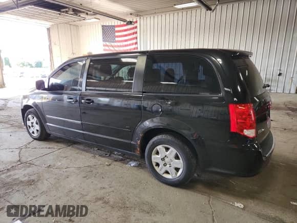 2013 Dodge Grand Caravan SE with VIN 2C4RDGBG8DR557104, listed as a Copart auction lot 85081415 with 207,924 mi miles and Clean title. Bid and sale history available at DreamBid. Image 2.