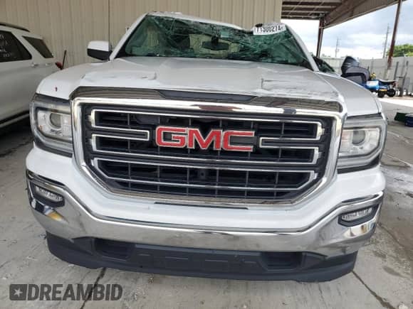 2018 GMC Sierra 1500 SLE с VIN 3GTP1MEH2JG261600, выставлен на аукционе Copart как лот 71300274 с пробегом Не указан миль и На запчасти • Non repairable. История ставок и продаж доступна на DreamBid. Изображение 5.