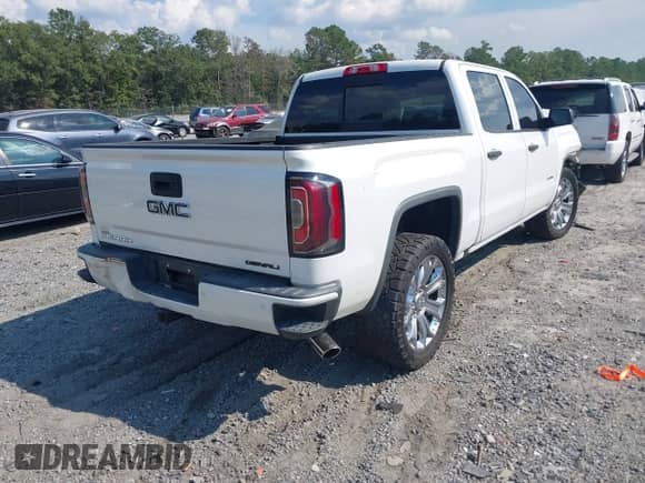 2017 GMC Sierra 1500 Denali z VIN 3GTU2PEC5HG411196, wystawiony jako IAAI lot #43264769 z przebiegiem 126 670 mil mil oraz . Historia ofert i sprzedaży dostępna na DreamBid. Obrazek 4.