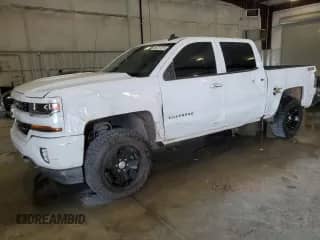 2018 Chevrolet Silverado 1500 LT with VIN 3GCUKREC1JG198247, listed as a Copart auction lot 66737575 with 151,198 mi miles and Salvage title. Bid and sale history available at DreamBid. Image 1.