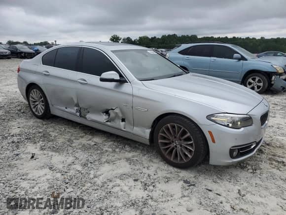 2014 BMW 5 Series 528i z VIN WBA5A5C57ED505411, wystawiony jako Copart lot #69820495 z przebiegiem 134 131 mil mil oraz Szkoda całkowita • Salvage title. Historia ofert i sprzedaży dostępna na DreamBid. Obrazek 4.
