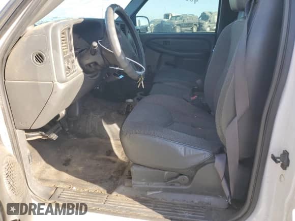 2003 GMC Sierra 1500 Work Truck with VIN 1GTEC14V33E292968, listed as a Copart auction lot 73603084 with 146,228 mi miles and Salvage title. Bid and sale history available at DreamBid. Image 7.