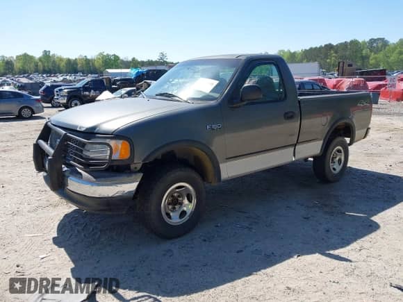 2003 Ford F-150 XL z VIN 1FTRF18243NB29920, wystawiony jako IAAI lot #42037138 z przebiegiem 230 215 mil mil oraz . Historia ofert i sprzedaży dostępna na DreamBid. Obrazek 2.