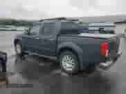 2010 Nissan Frontier LE with VIN 1N6AD0EV0AC419279, listed as a Copart auction lot 82463385 with 83,722 mi miles and Salvage title. Bid and sale history available at DreamBid. Image 2.