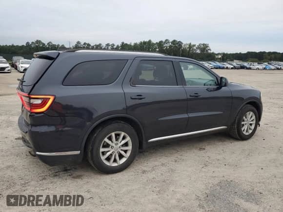 2014 Dodge Durango SXT with VIN 1C4RDHAG4EC974527, listed as a Copart auction lot 71512885 with 173,145 mi miles and Salvage title. Bid and sale history available at DreamBid. Image 3.