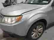 2012 Subaru Forester X Premium z VIN JF2SHADC9CH448112, wystawiony jako IAAI lot #43592598 z przebiegiem 105 556 mil mil oraz . Historia ofert i sprzedaży dostępna na DreamBid. Obrazek 13.