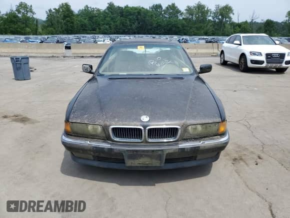 1997 BMW 7 Series 740iL with VIN WBAGJ8328VDM00294, listed as a Copart auction lot 64585595 with Not provided miles and Clean title. Bid and sale history available at DreamBid. Image 5.