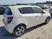 2013 Chevrolet Sonic LTZ с VIN 1G1JE6SB7D4200291, выставлен на аукционе Copart как лот 66943785 с пробегом 126 250 миль миль и Чистый • Clean title. История ставок и продаж доступна на DreamBid. Изображение 3.