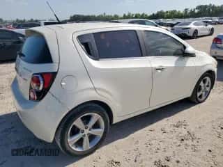 2013 Chevrolet Sonic LTZ z VIN 1G1JE6SB7D4200291, wystawiony jako Copart lot #66943785 z przebiegiem 126 250 mil mil oraz Czysty tytuł • Clean title. Historia ofert i sprzedaży dostępna na DreamBid. Obrazek 3.