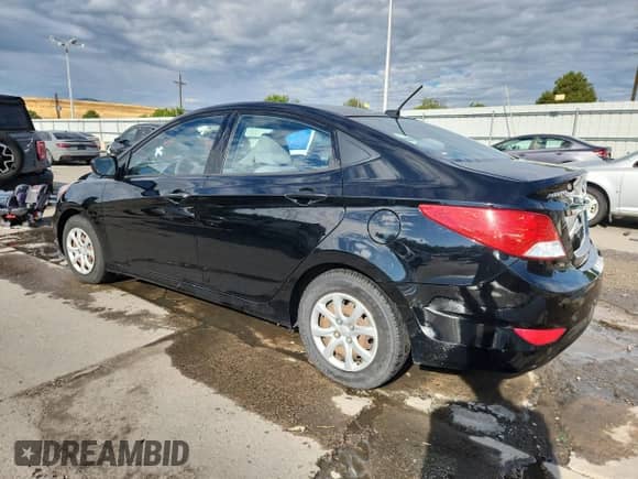 2012 Hyundai Accent GLS z VIN KMHCT4AE0CU062657, wystawiony jako Copart lot #70486255 z przebiegiem 100 059 mil mil oraz Szkoda całkowita • Salvage title. Historia ofert i sprzedaży dostępna na DreamBid. Obrazek 2.